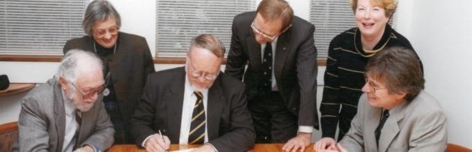 Dr Herbert Freilich, Mrs Valmae Freilich, Professor Deane Terrell, Vice Chancellor of the University, Professor Peter Baume, Chancellor of the University, Ms Maureen McInroy, Acting University Secretary, Professor Iain McCalman, at the signing of the Foundation charter, July 1999